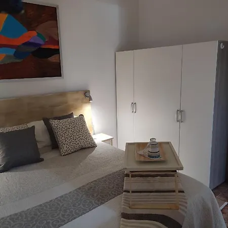 Апартаменты Apartamento Bajo Quintero Алькала